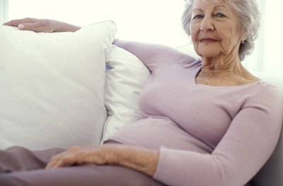 Woman resting on couch
