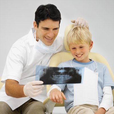 Dentist with young patient.