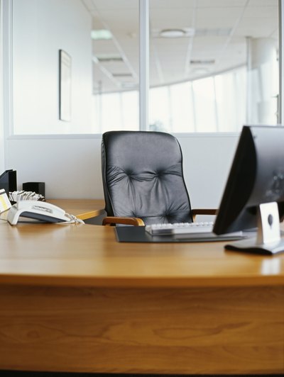 The Office Star Deluxe Ergonomic Chair is a leather adjustable seat.
