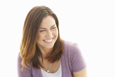 A woman laughs.