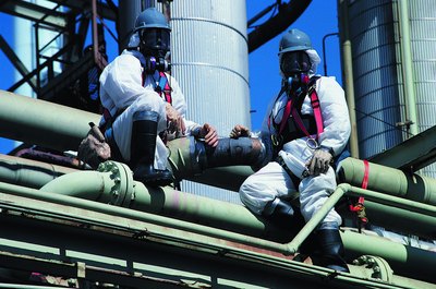 Asbestos removal team at industrial site