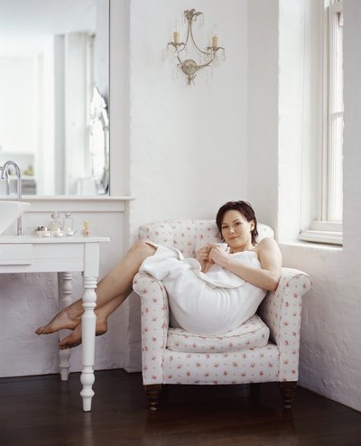 Woman slouching in chair