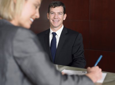 Woman at hotel front desk