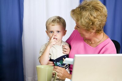child picking his nose