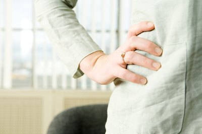 Woman with hand on hip