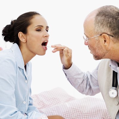 Doctor checking patient