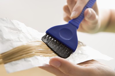 painting highlights onto hair