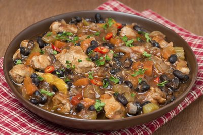 Chopped fresh cilantro livens up the flavor and appearance of a bowl of chicken stew.