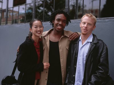 3 friends meet outside.