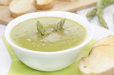 Bowl of creamy asparagus soup.