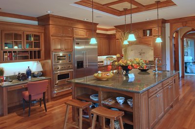 Base your floor choice on the fact your cabinets will get darker.