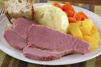 Slices of corned beef and vegetables.