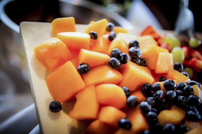 Canteloupes as part of a fruit platter.