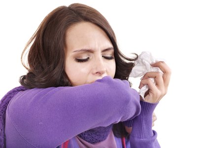 Young woman with a cough.