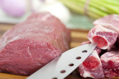 Beef being cut up with knife