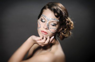 Rhinestones on face.