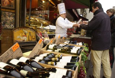 People buy crepes from street chef in Paris, France