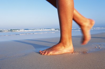 Woman walking on beach
