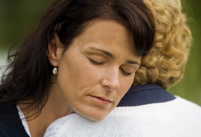 Woman being comforted