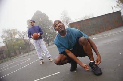 Man tying shoe