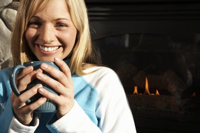 Woman drinking kombucha tea from mug