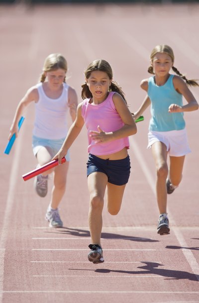 Girls having relay race
