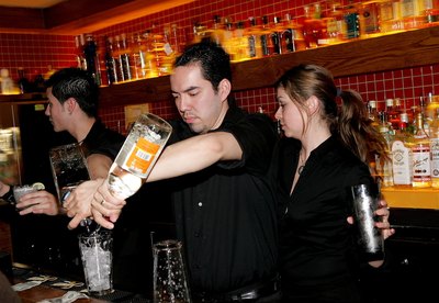 Bartenders making margaritas