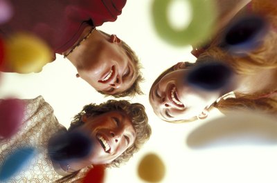 Friends playing game at party