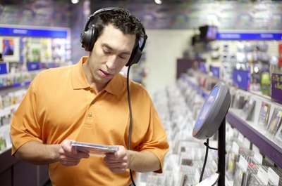 Man listening to music in a record store