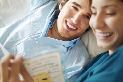 Woman laughing reading card