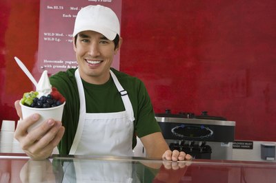 man handing over ice cream