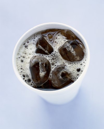 A cup with cola and ice.