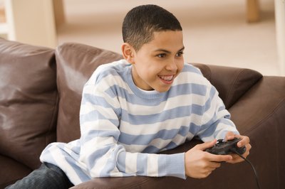 Young boy playing video game