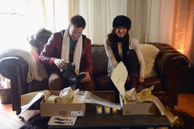 Couple trying on boots