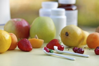 Fresh produce and vitamins on a counter top