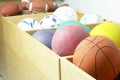 Boxes of sports balls and indoor playground