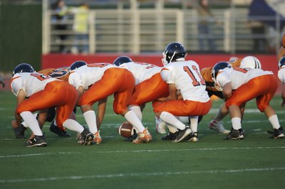 Young men playing football