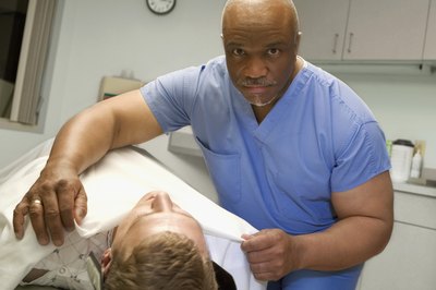 doctor prepping patient for surgery