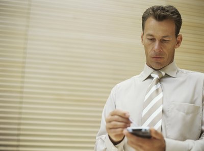 Man writing on tablet