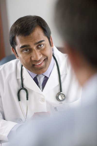 Doctor explains to patient