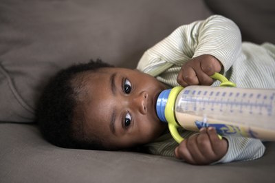 Baby drinking from bottle