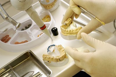 . A removal implant resembles a traditional denture.