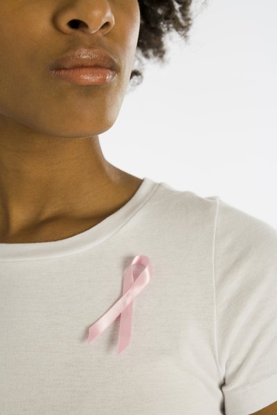 Woman wearing Breast Cancer awareness ribbon
