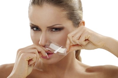 Olive oil will help remove any leftover wax.