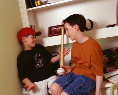 Boys with bat and ball