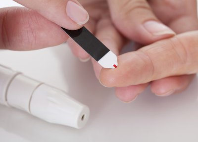 Diabetic getting a blood sugar test