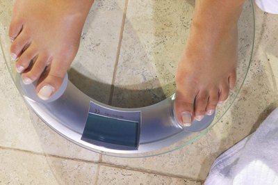 woman's feet on scale