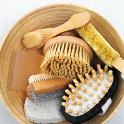 Use a wet pumice stone to gently rub the callused area