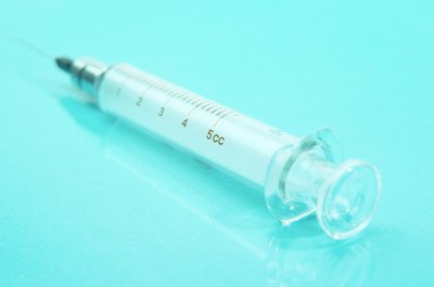 A bulb syringe with baking soda and water used properly can help relieve plugged ears.
