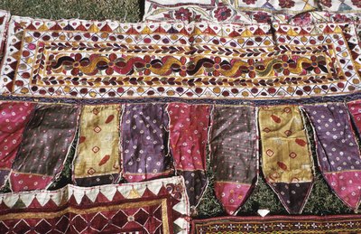 A quilt is sewn from the patches to keep the baby warm and protected at night.
